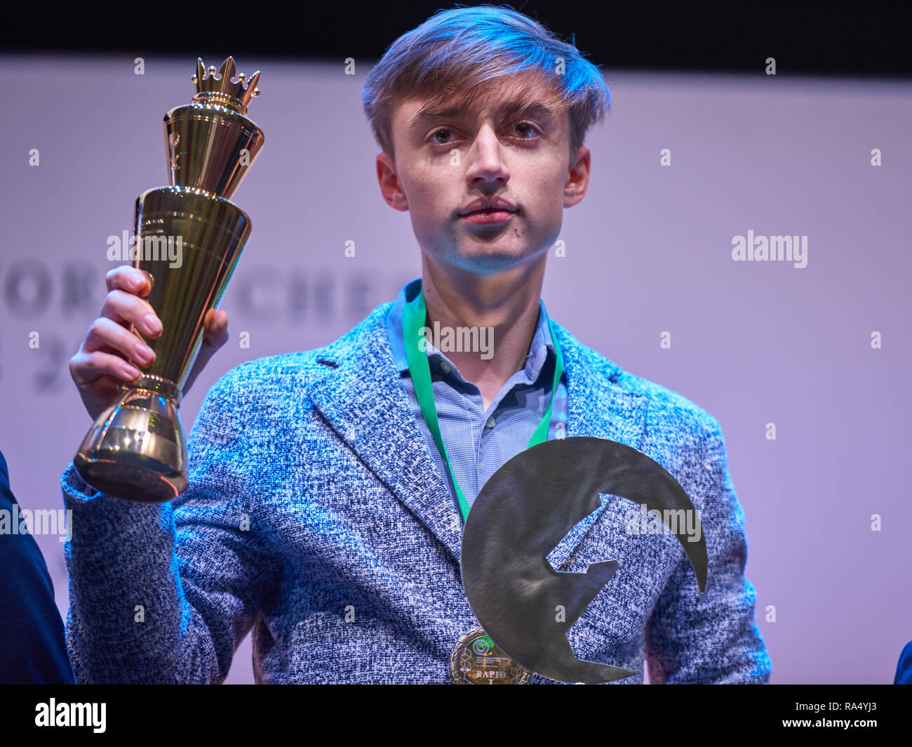 St. Petersburg, Russia - December 30, 2018: Grandmaster Daniil Dubov,  Russia holding the golden cup of World Rapid Chess Championship 2018 during  awar Stock Photo - Alamy