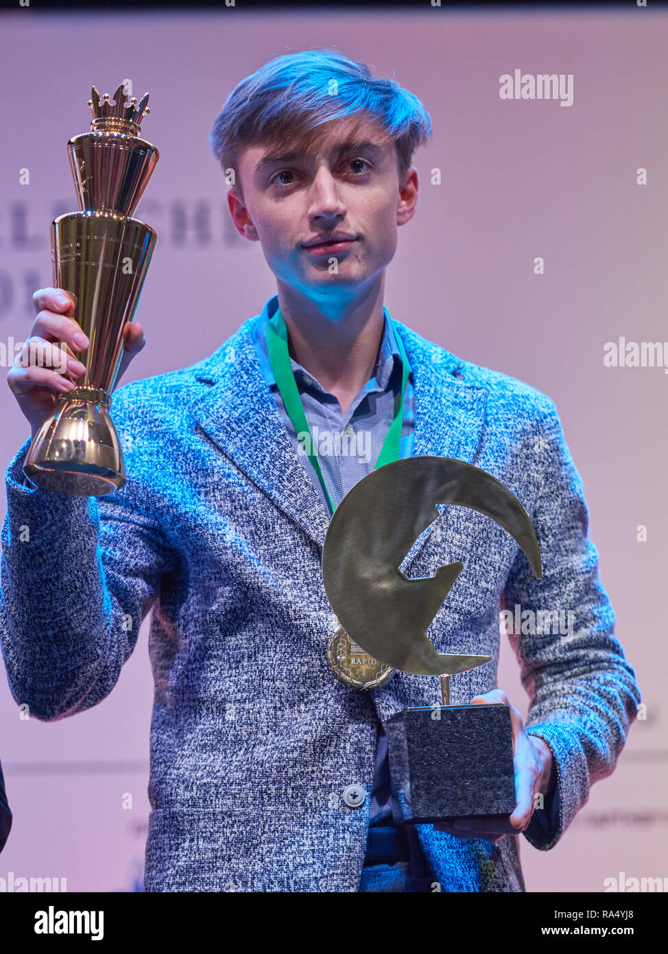 L to R) Bronze medalist Daniil Dubov of Russian , gold medalist Sergey  Karjakin of Russian and silver medalist Magnus Carlsen of Norway pose on  the podium at the medal ceremony for