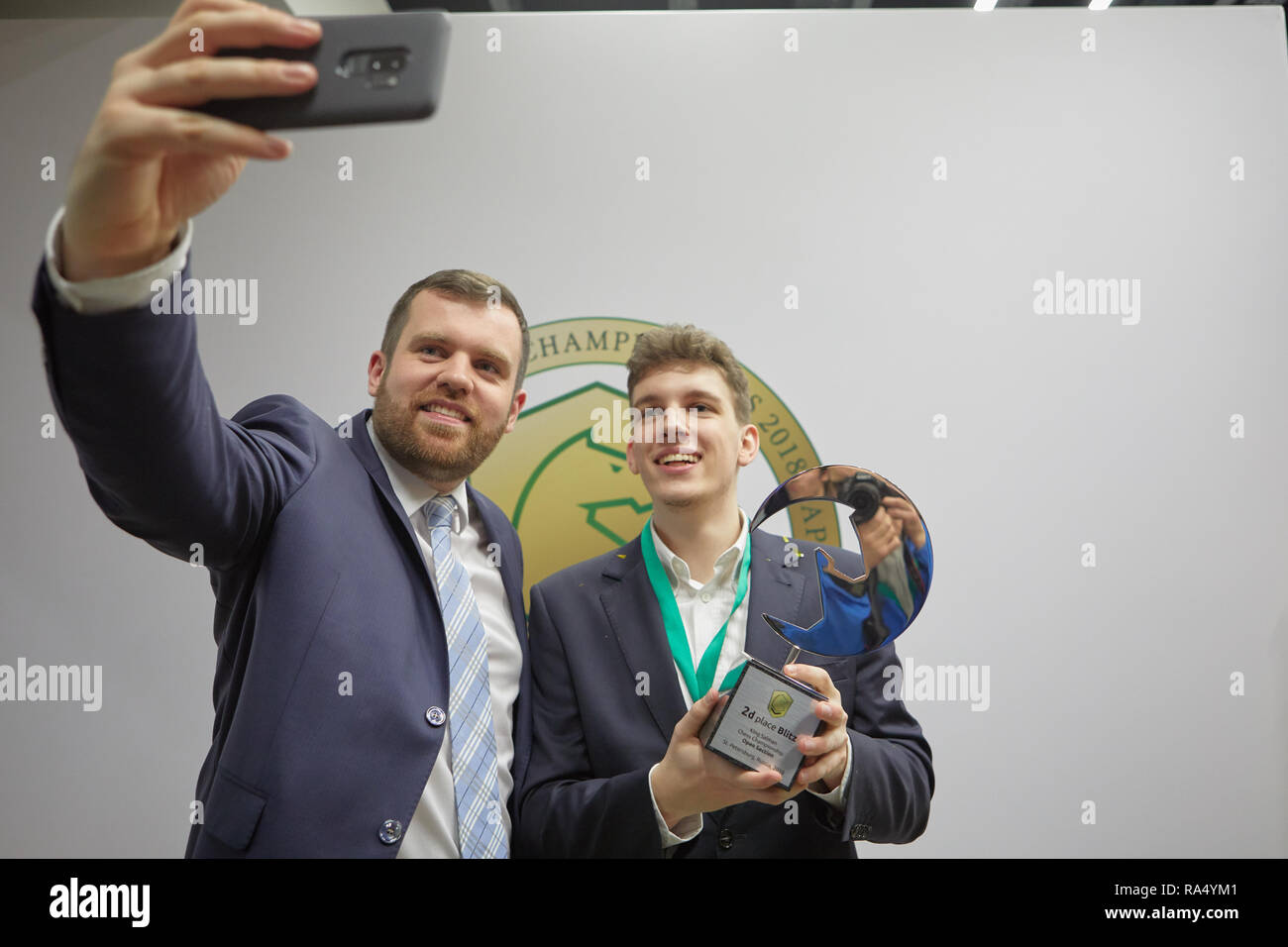 St. Petersburg, Russia - December 30, 2018: Grandmaster Daniil Dubov,  Russia holding the golden cup of World Rapid Chess Championship 2018 after  award Stock Photo - Alamy