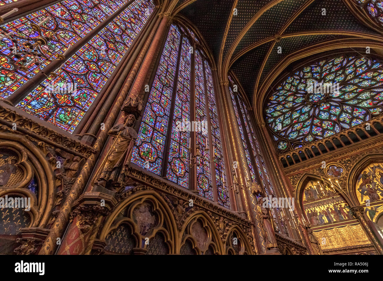 Detail of a stained glass window in SainteChapelle , a royal chapel in the Gothic style, within