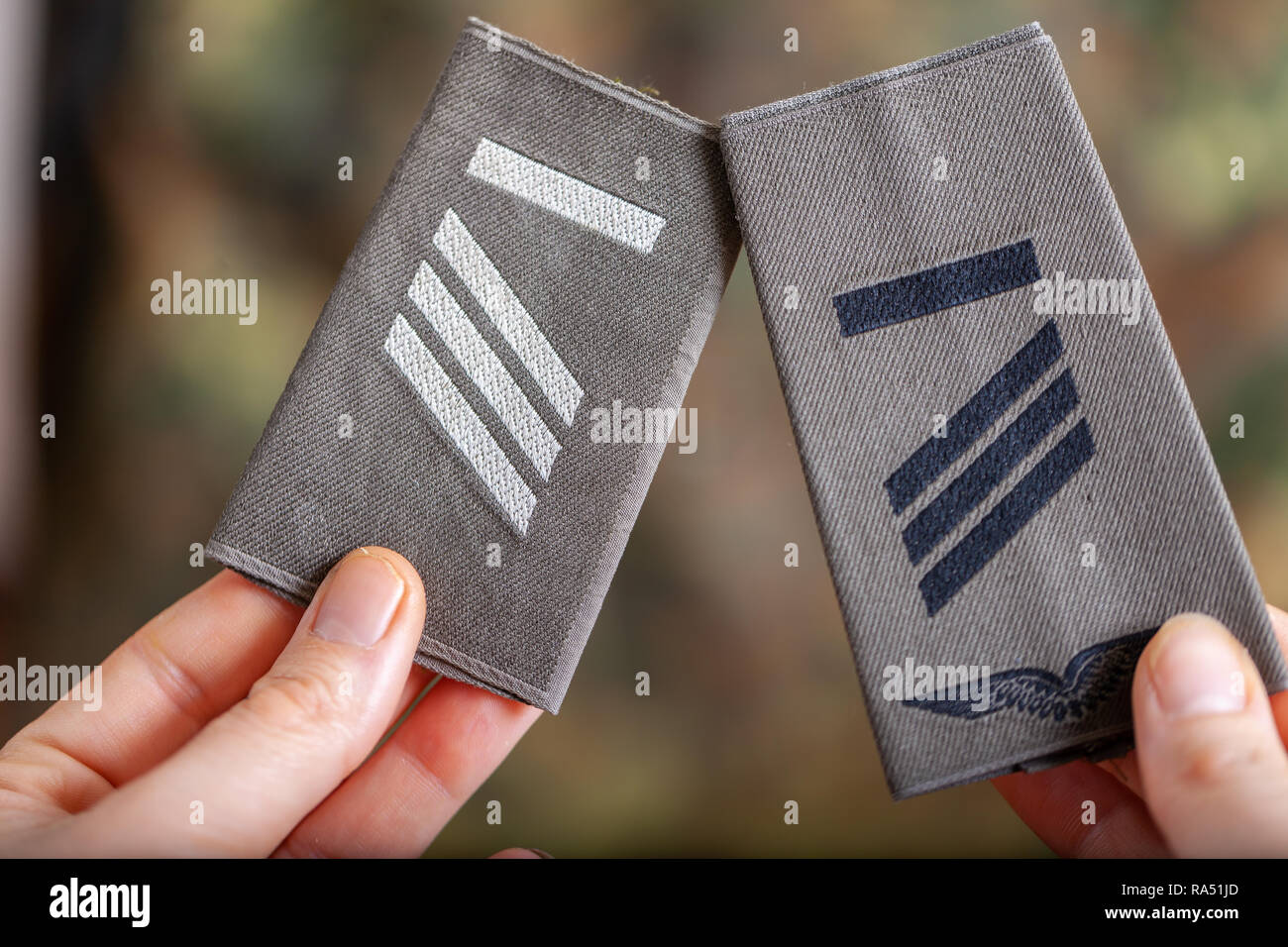2d Shoulder Ranks german shoulder ranks on a camouflage background Stock Photo - Alamy