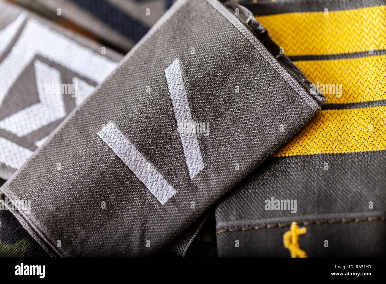 german shoulder ranks on a camouflage background Stock Photo - Alamy