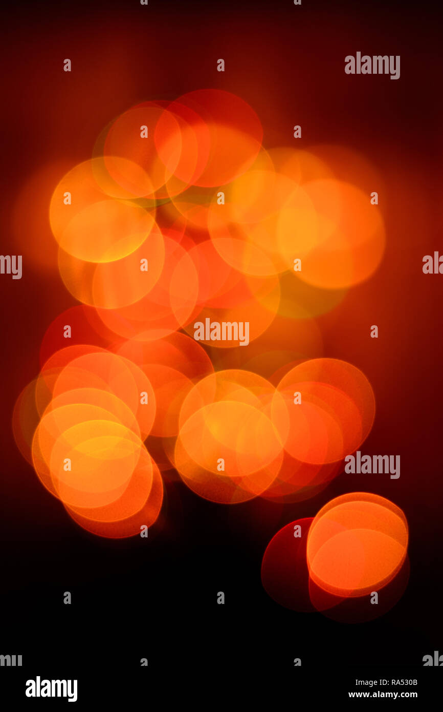 bokeh in the red and orange tones of New Year's mood blurred background ...
