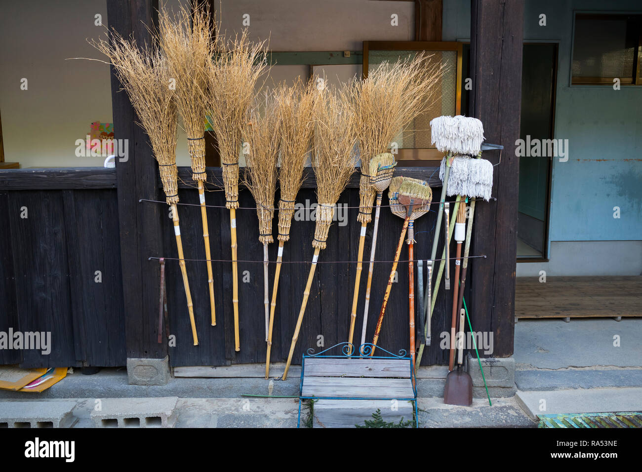 Nagasaki, Japan - October 24, 2018: Traditional straw brooms to clean and maintain the temple grounds Stock Photo