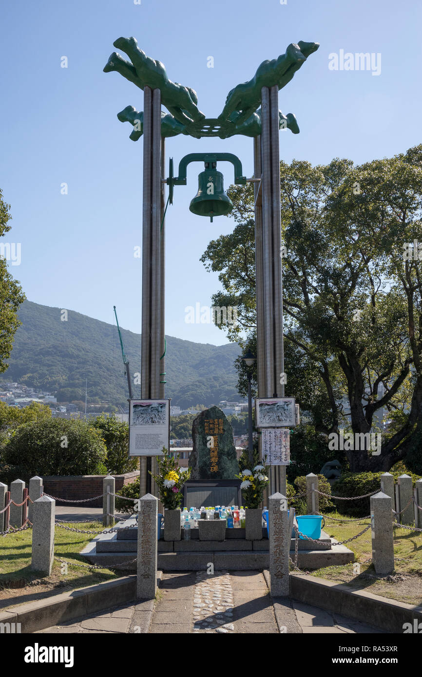 Nagasaki, Japan - October 25, 2018: Statue of the Nagasaki peace bell in the Peace Memorial Park Stock Photo