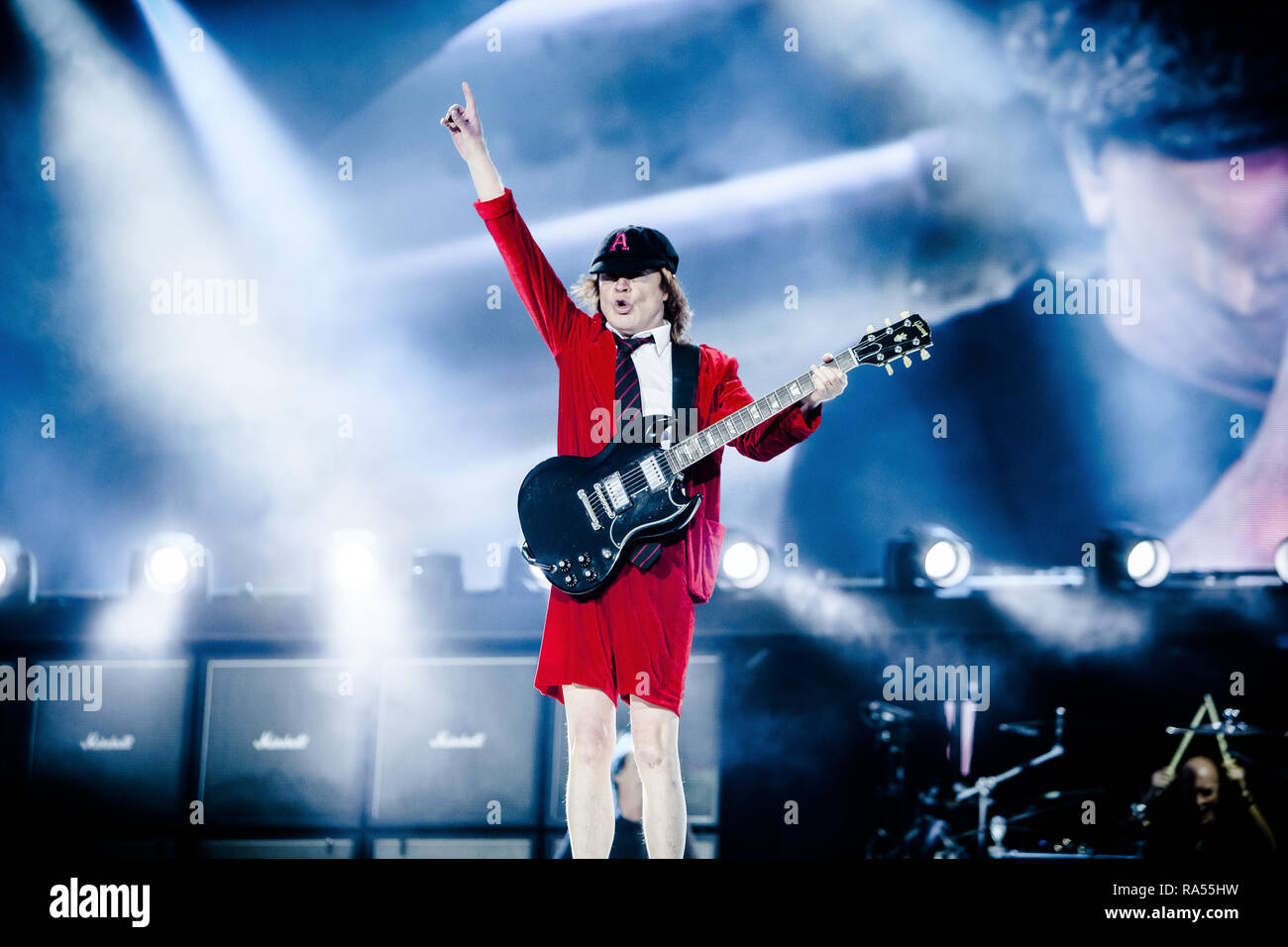 The Australian rock band AC/DC performs a live concert at Dyreskuepladsen in Roskilde as part of the Rock or Bust World 2015 Tour. Here musician and guitarist Angus Young is seen live on stage. Denmark, 15/07 2015. EXCLUDING DENMARK Stock Photo