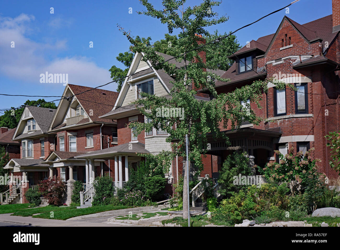 Street Of Large Older Houses With Gables And Dormers Stock Photo
