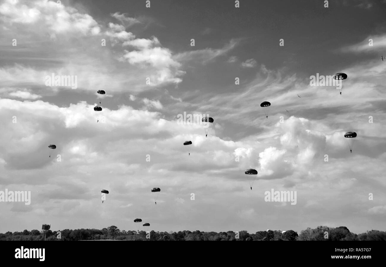 World War II era parachute drop in black and white Stock Photo