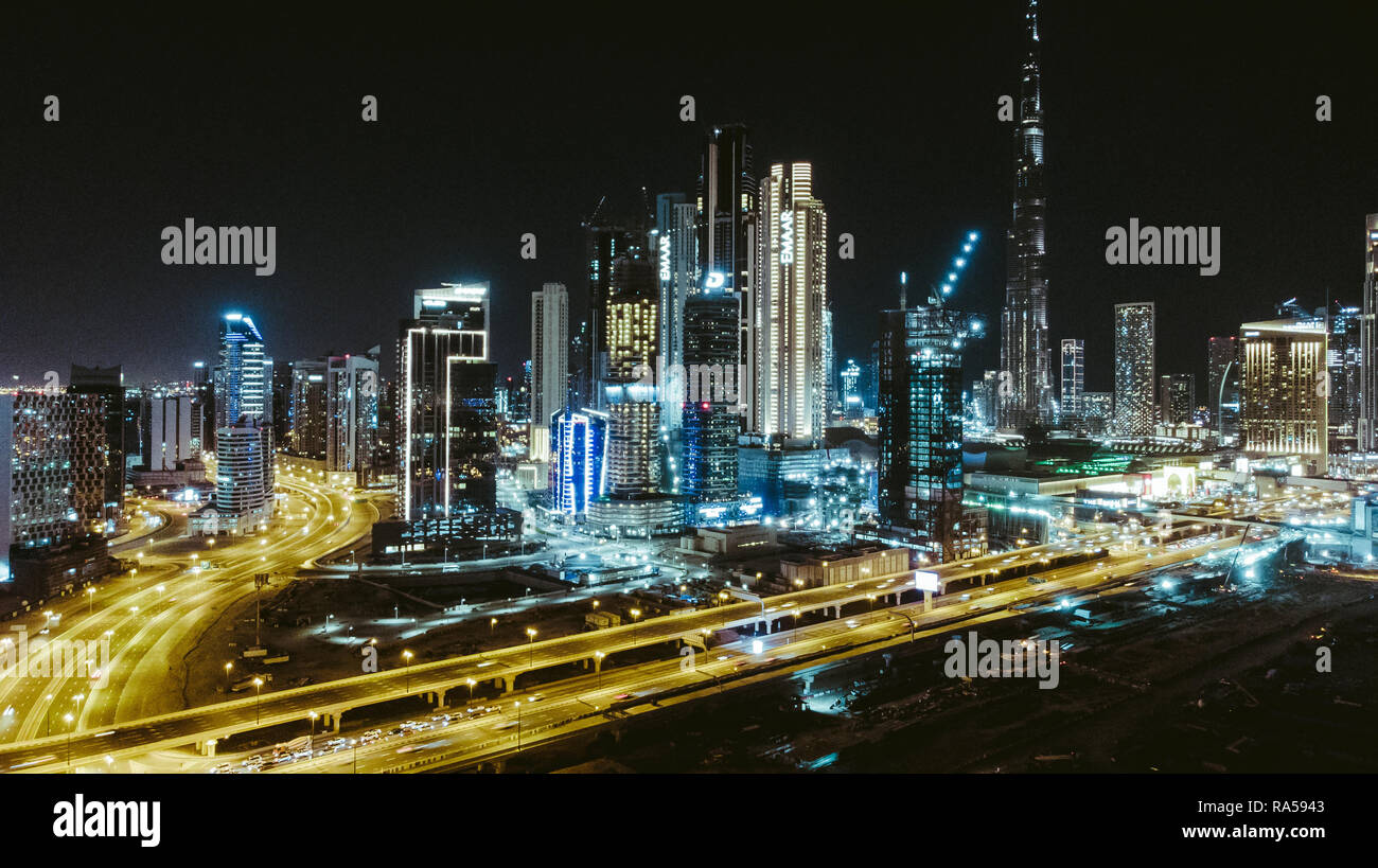aerial Dubai skyline by night Stock Photo