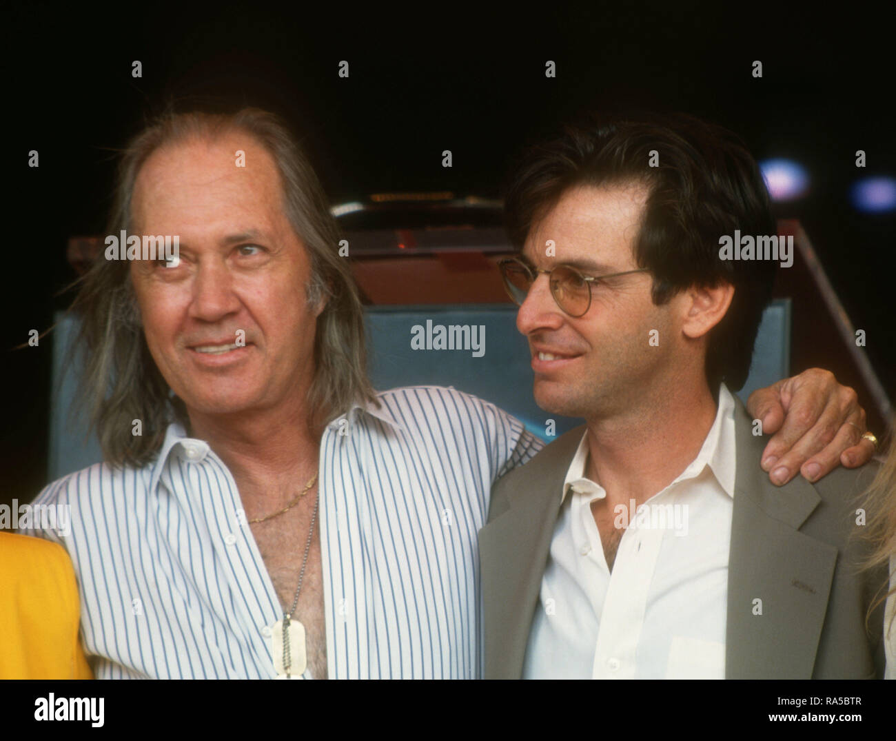 HOLLYWOOD, CA - JULY 15: Actors/brothers David and Robert Carradine attend Keith Carradine Star Ceremony on July 15, 1993 on Hollywood Walk of Fame in Hollywood, California. Photo by Barry King/Alamy Stock Photo Stock Photo