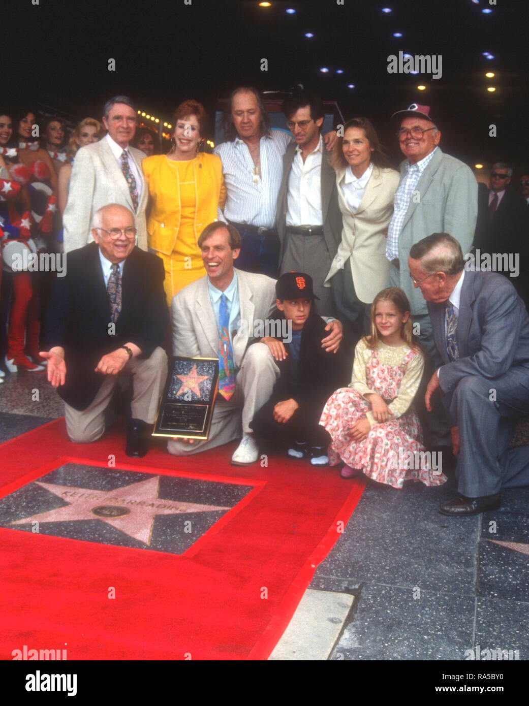 HOLLYWOOD, CA - JULY 15: Actress Carol Burnett, actor David Carradine, actor Robert Carradine, Sandra Will Carradine, actor/honoree Keith Carradine, son Cade Carradine and guests attend ceremony for his Star Ceremony on July 15, 1993 on Hollywood Walk of Fame in Hollywood, California. Photo by Barry King/Alamy Stock Photo Stock Photo