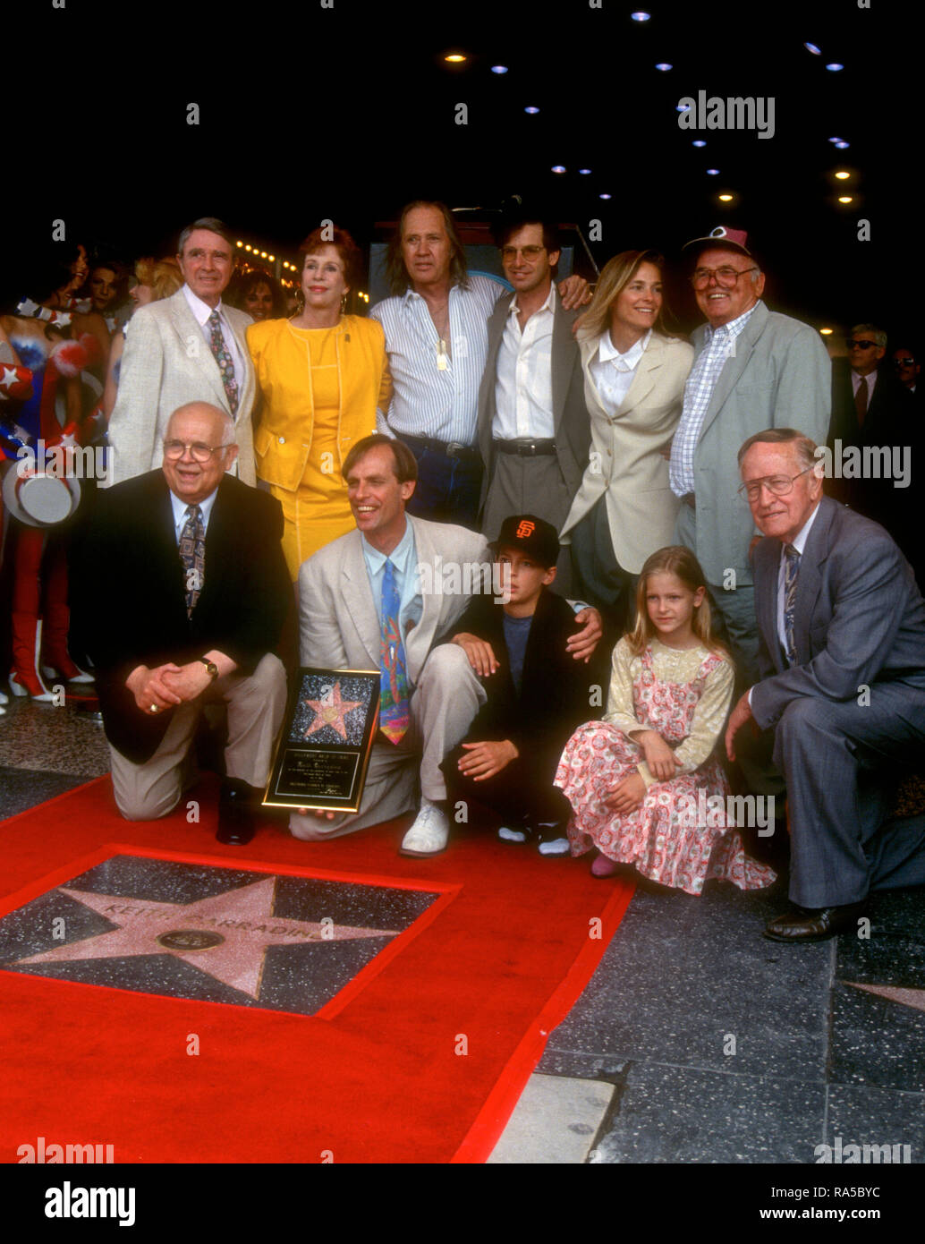 HOLLYWOOD, CA - JULY 15: Actress Carol Burnett, actor David Carradine, actor Robert Carradine, Sandra Will Carradine, actor/honoree Keith Carradine, son Cade Carradine and guests attend ceremony for his Star Ceremony on July 15, 1993 on Hollywood Walk of Fame in Hollywood, California. Photo by Barry King/Alamy Stock Photo Stock Photo