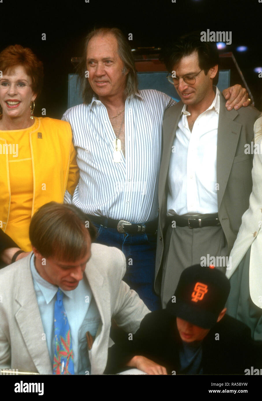 HOLLYWOOD, CA - JULY 15: Actress Carol Burnett, actor David Carradine, actor Robert Carradine, actor/honoree Keith Carradine and son Cade Carradine attend ceremony for his Star Ceremony on July 15, 1993 on Hollywood Walk of Fame in Hollywood, California. Photo by Barry King/Alamy Stock Photo Stock Photo