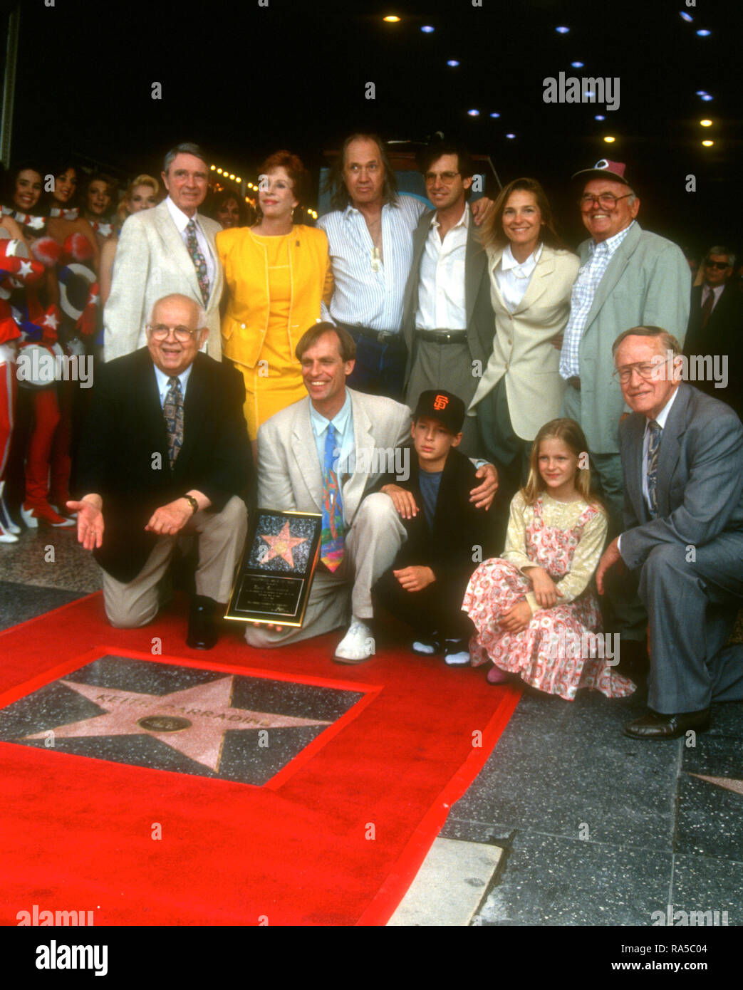 HOLLYWOOD, CA - JULY 15: Actress Carol Burnett, actor David Carradine, actor Robert Carradine, Sandra Will Carradine, actor/honoree Keith Carradine, son Cade Carradine and guests attend ceremony for his Star Ceremony on July 15, 1993 on Hollywood Walk of Fame in Hollywood, California. Photo by Barry King/Alamy Stock Photo Stock Photo