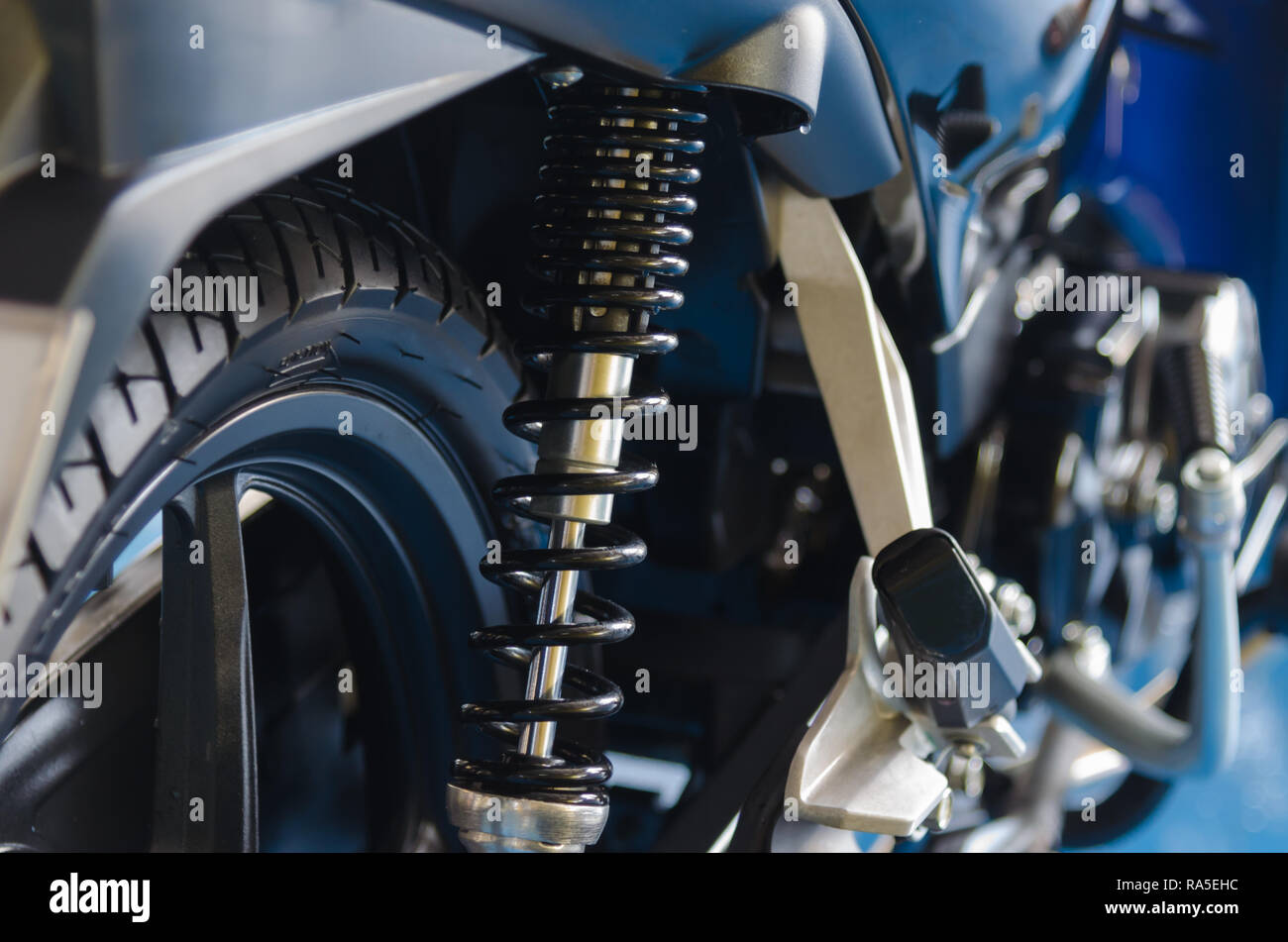 Black motorcycle shock absorbers Stock Photo - Alamy