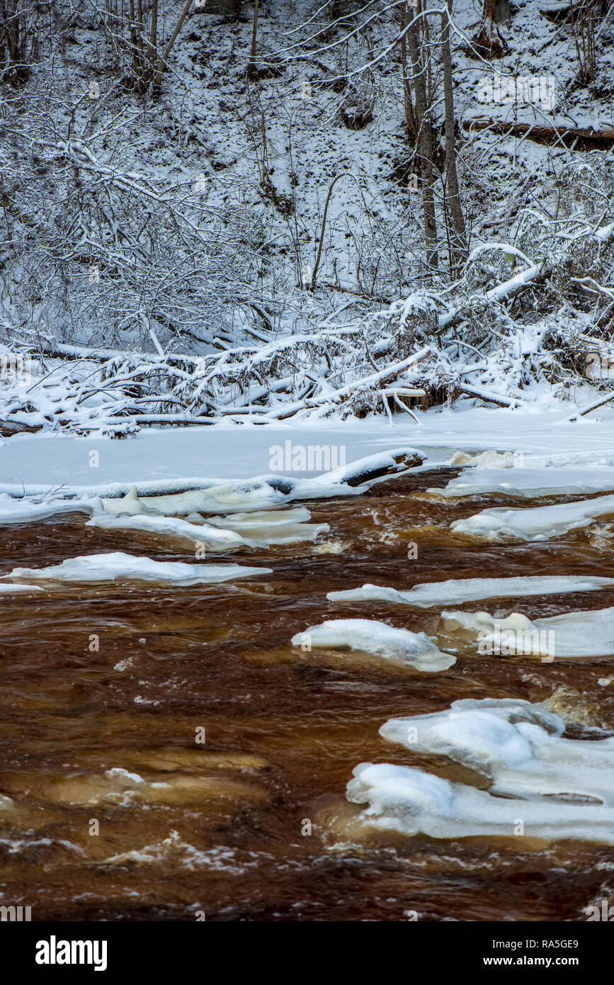 frozen ice and snow in river in winter, landscape view of frosty ...