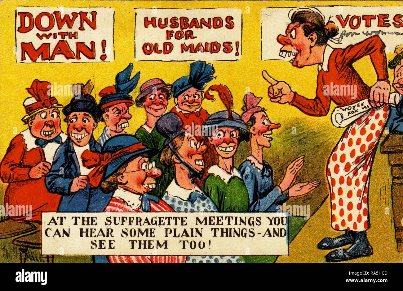 Anti-suffrage, color postcard, with a satirical illustration depicting a mature woman, with buck teeth, speaking to a group of unattractive, middle-aged women, with posters on a wall in the background reading 'Down with Man!' and 'Husbands for Old Maids!' and the derogatory caption 'At the suffragette meetings you can hear some plain things - and see them too!' published for the British market, 1900. () Stock Photo