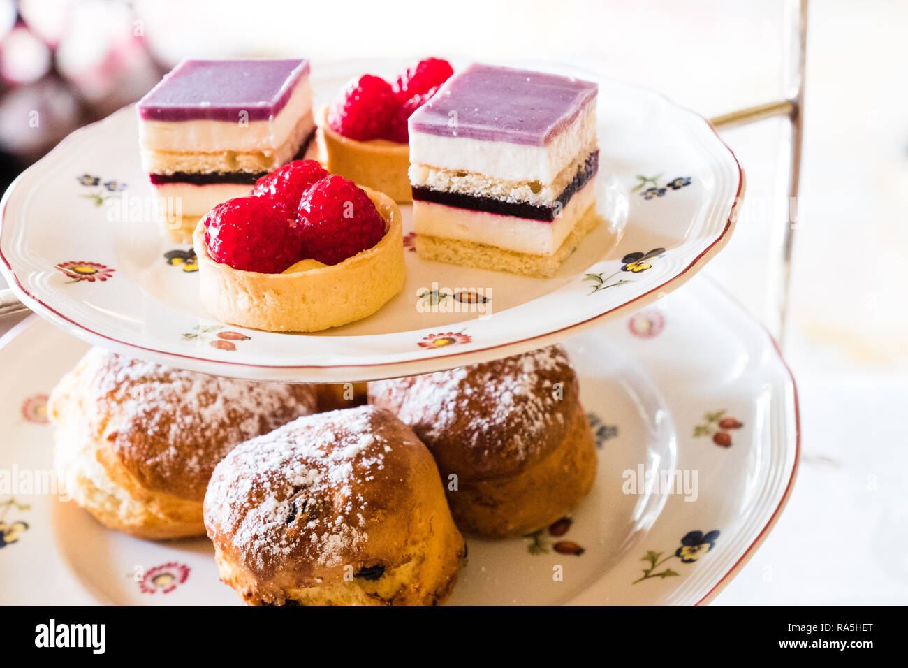 A stand full of delicious cakes for an English afternoon tea. Stock Photo