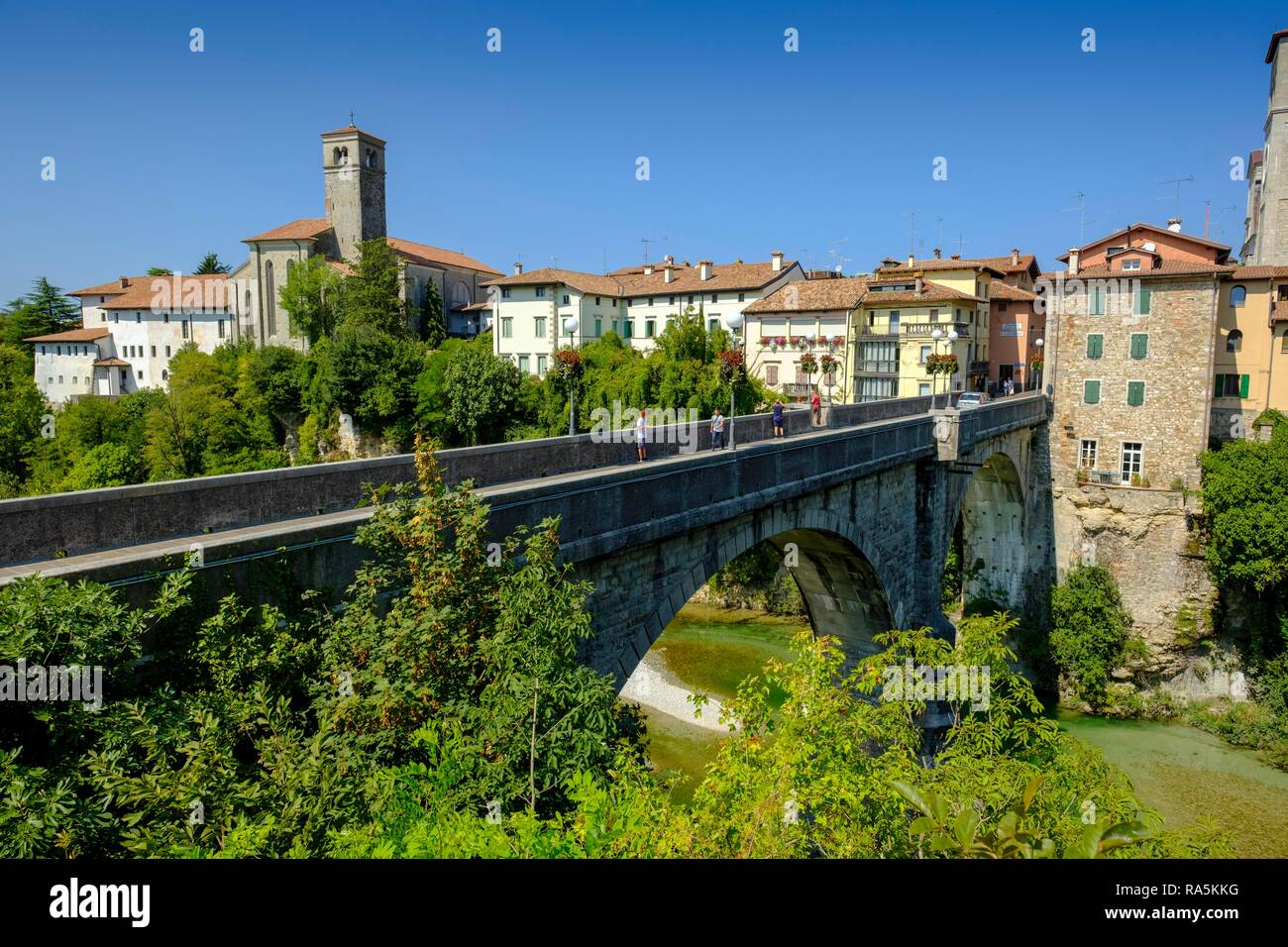 View over the river Natisone to the Campanile of the cathedral Santa Maria Assunta and the old town, Cividale del Friuli Stock Photo