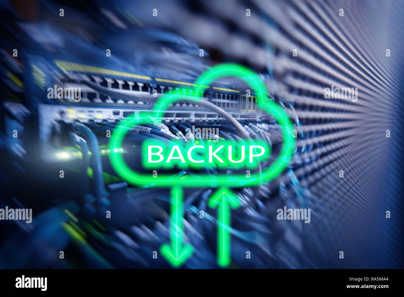 Backup button on modern server room background. Data loss prevention ...