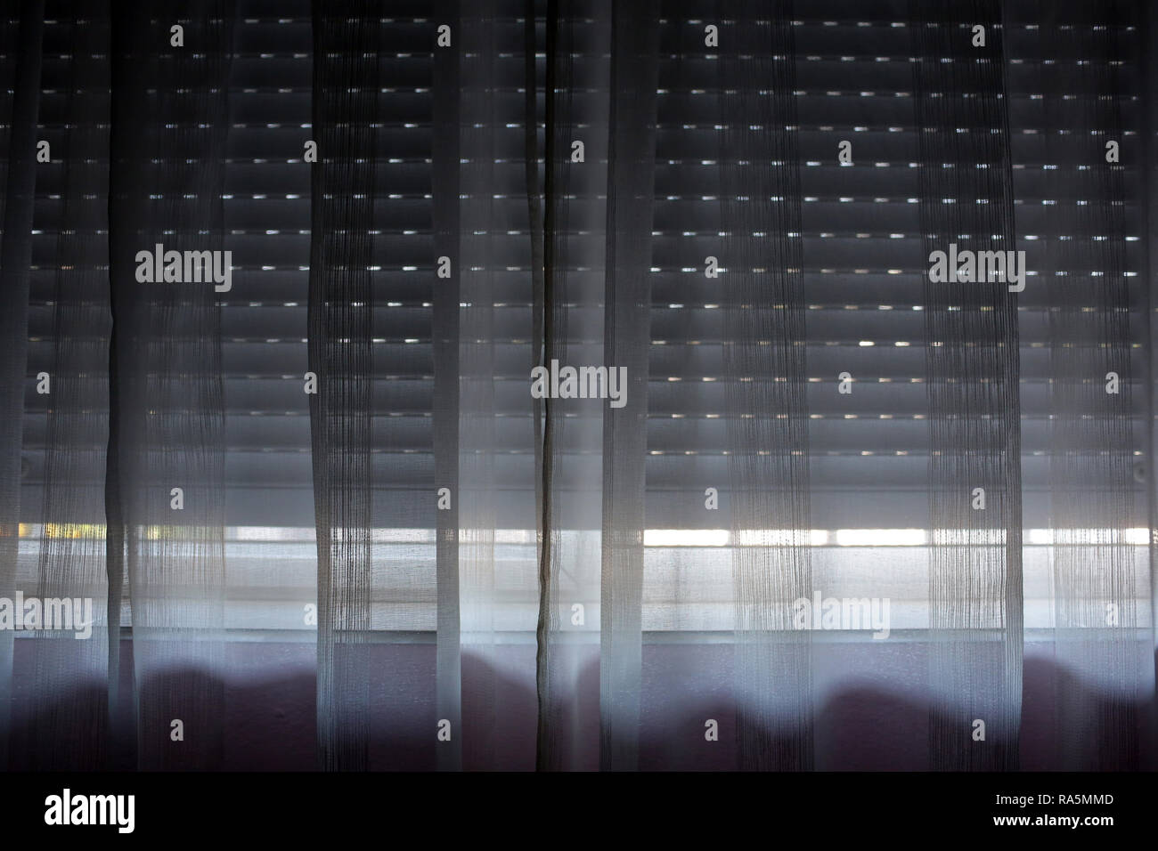 Net curtain and blind over window Stock Photo Alamy