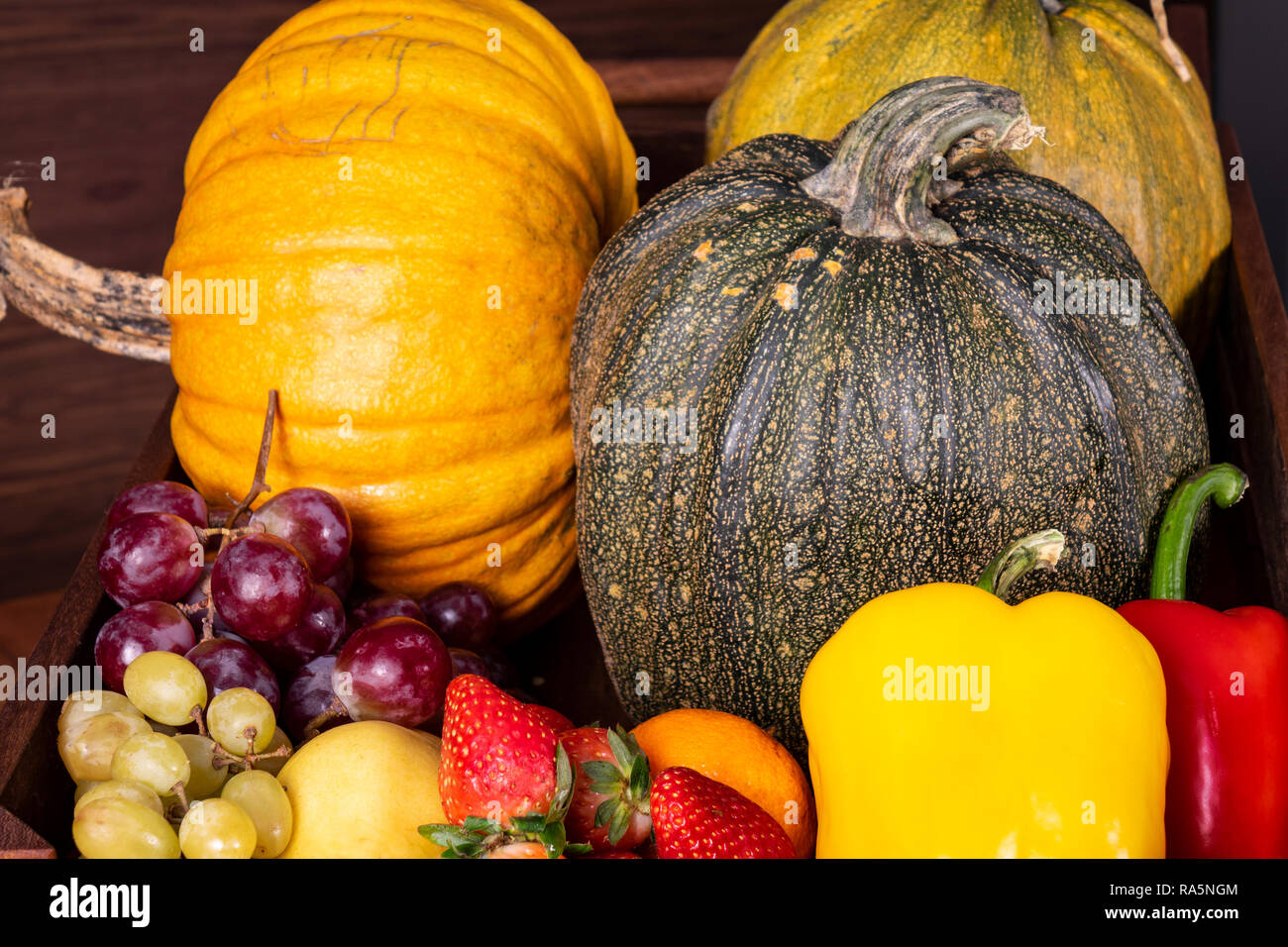 Fruits and vegetables with pumpkins in autumn still life Stock Photo ...