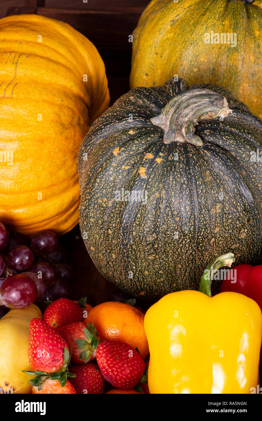 Fruits and vegetables with pumpkins in autumn still life Stock Photo ...