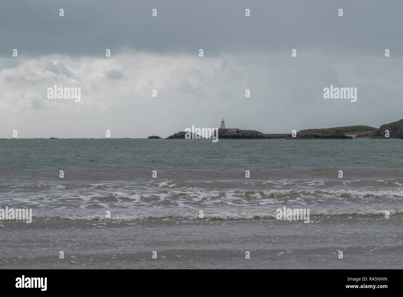 Grey Overcast Day at the Beach, Llanddwyn Bay, Anglesey, Wales, UK Stock Photo
