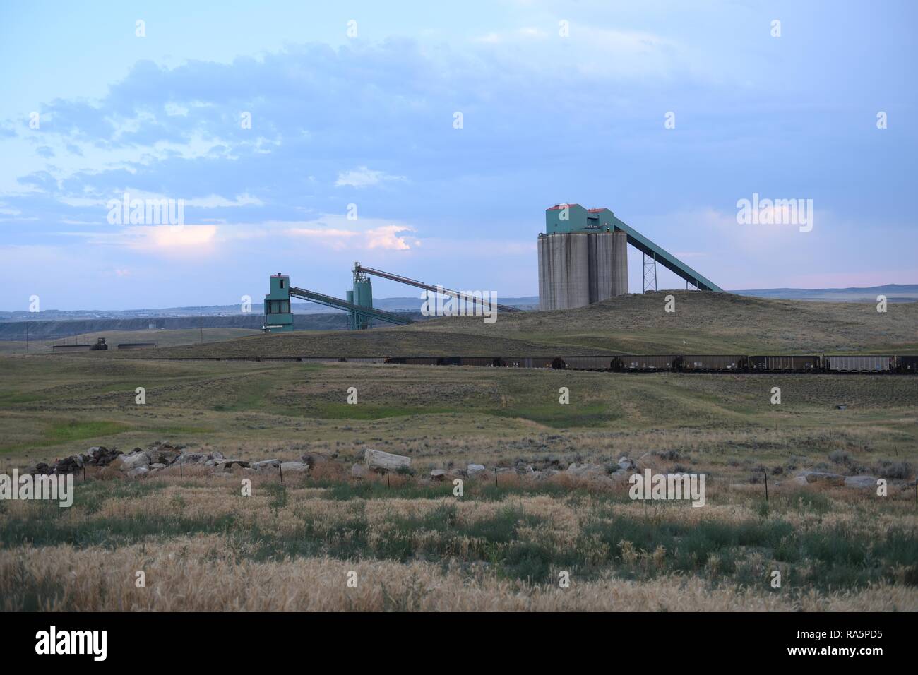 Coal train, coal mining silos, and processing operations in the Powder