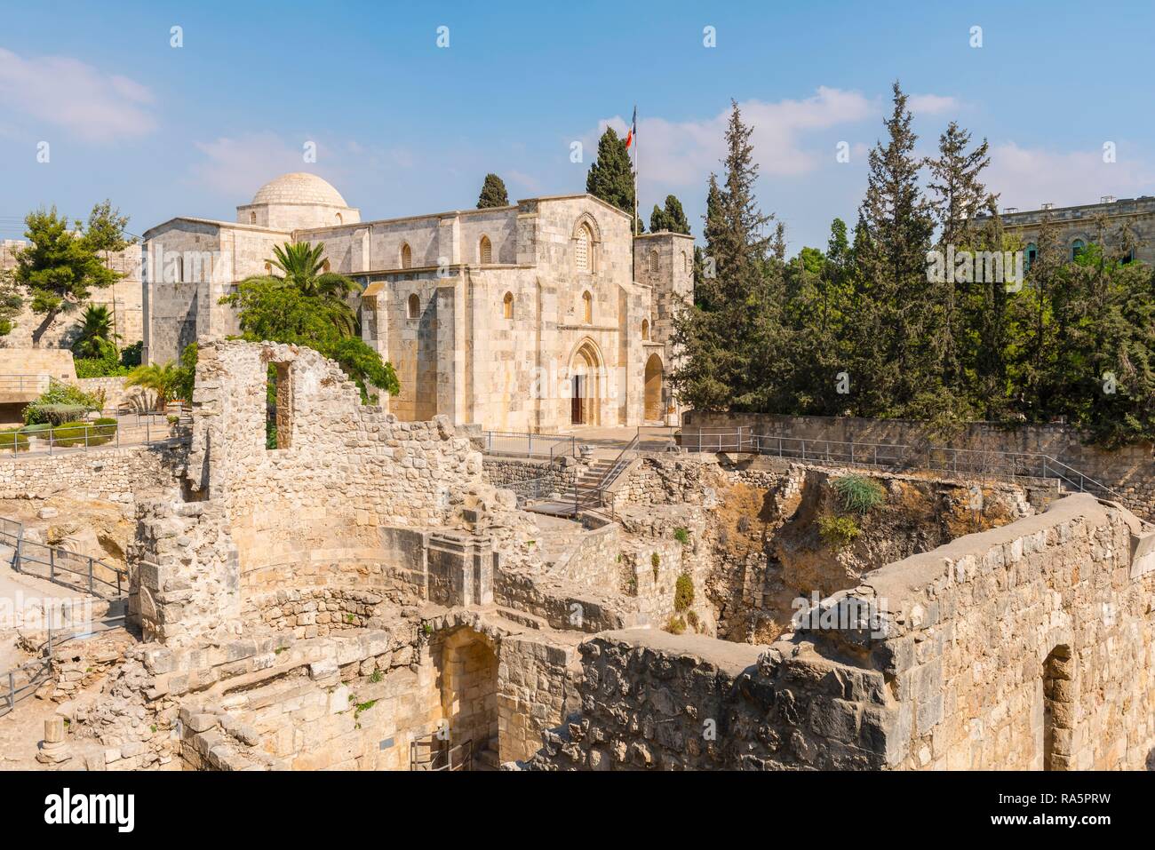 Roman ruins in front of the Romanesque St. Anne's Church, 12th century, Old Town, Jerusalem, Israel Stock Photo