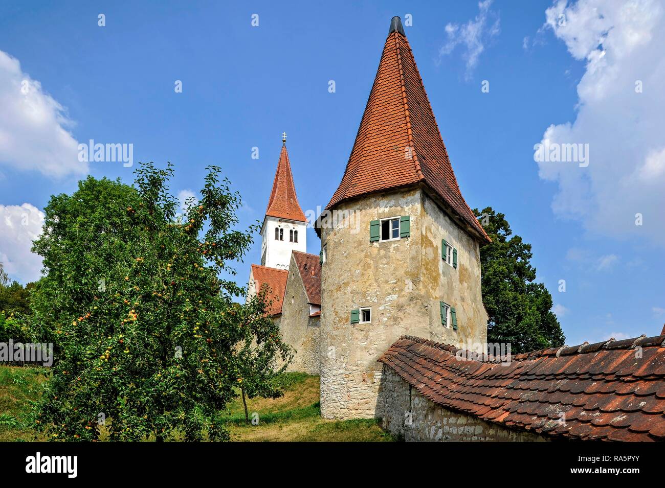 Medieval town wall with defensive defence tower, bell defence tower of the Romanesque basilica St. Martin, old town, Greding Stock Photo