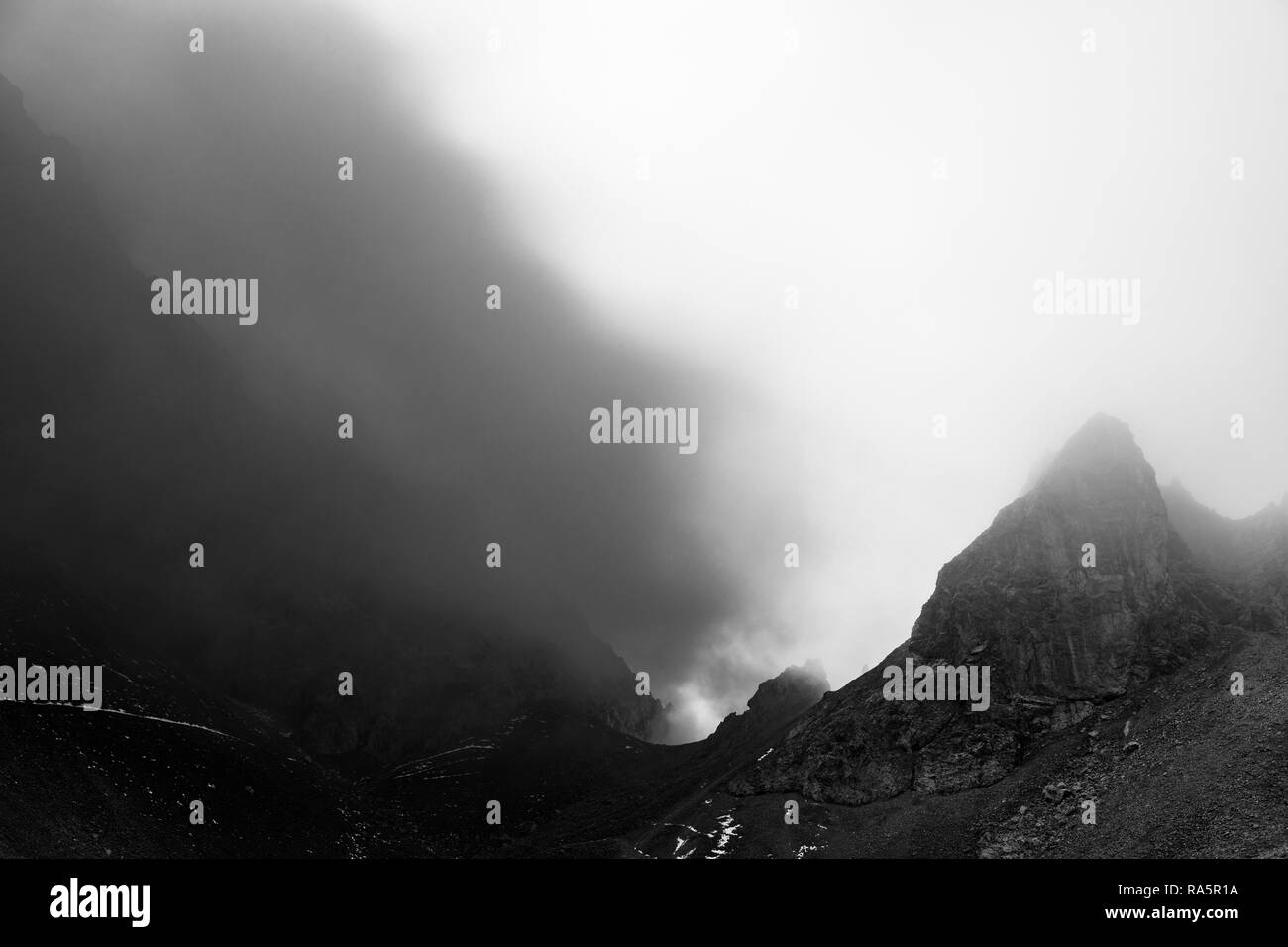 Rock tooth with fog, Ehrwald, Tyrol, Austria Stock Photo