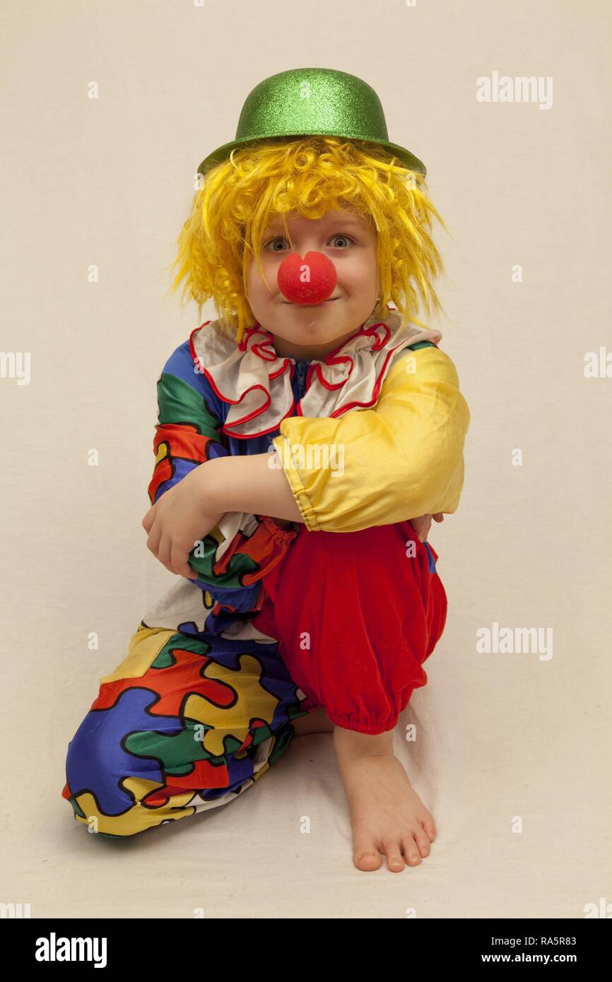 Boy dressed as a clown Stock Photo