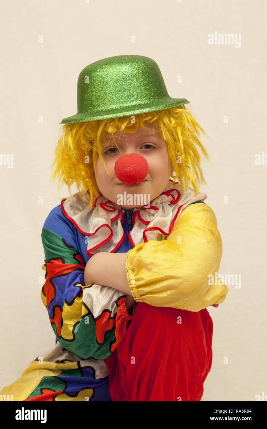 Boy dressed as a clown Stock Photo