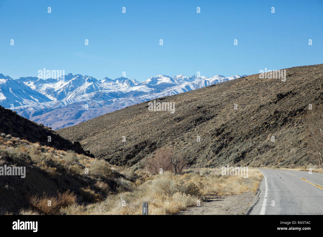 Snow capped mountains on the road from in California to Las