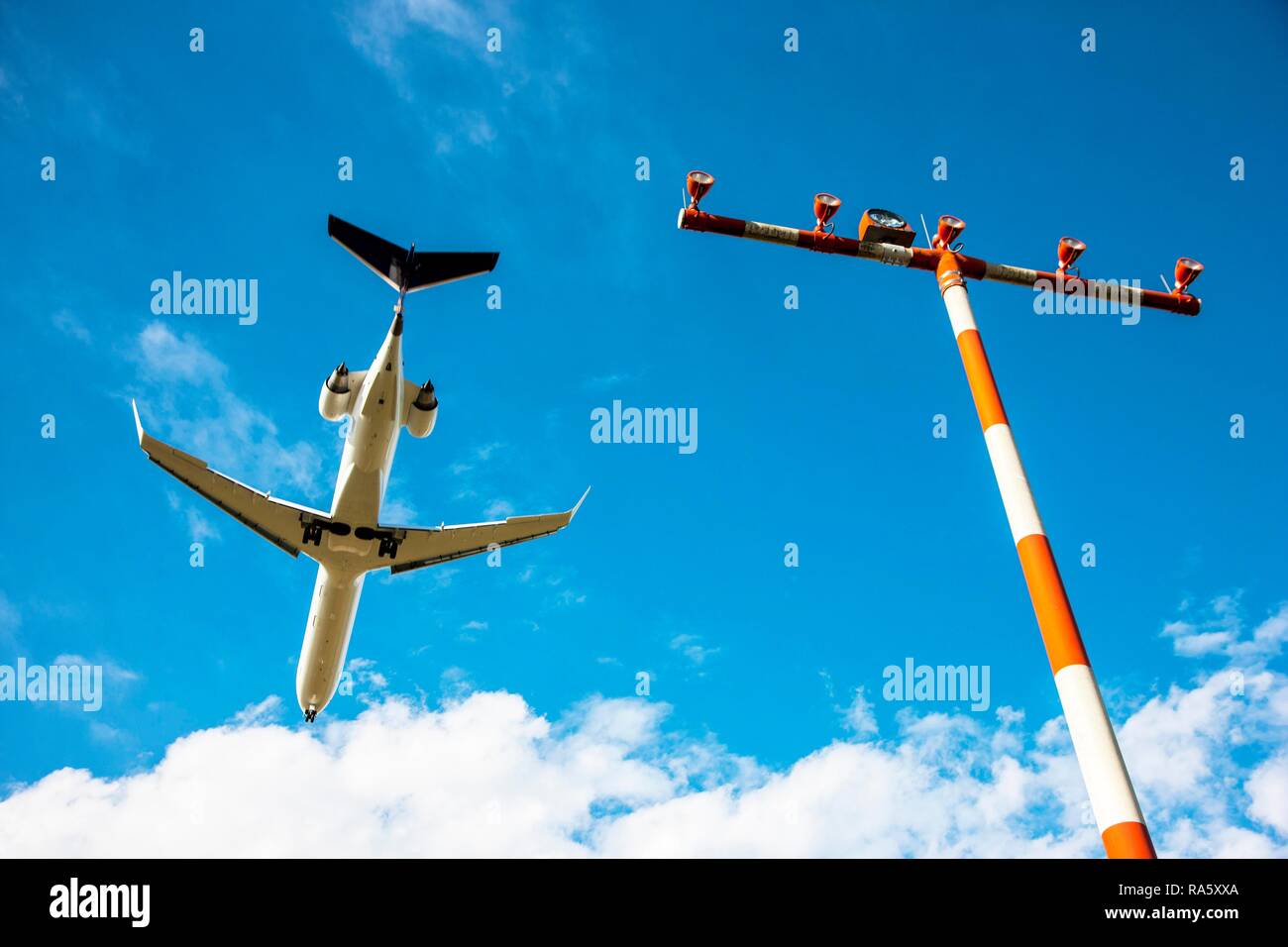 Passenger jet landing at Duesseldorf International Airport, Duesseldorf, North Rhine-Westphalia Stock Photo