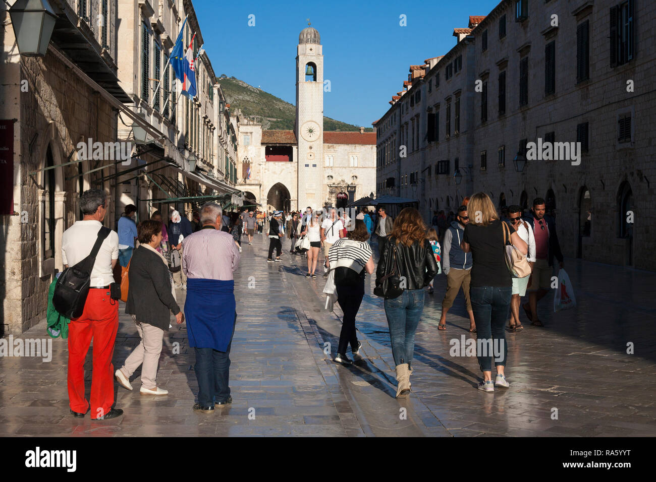 Tourists and visitors throng to every nook and cranny of the winding back streets  and alleys of the old town of Dubrovnik, Croatia. Stock Photo