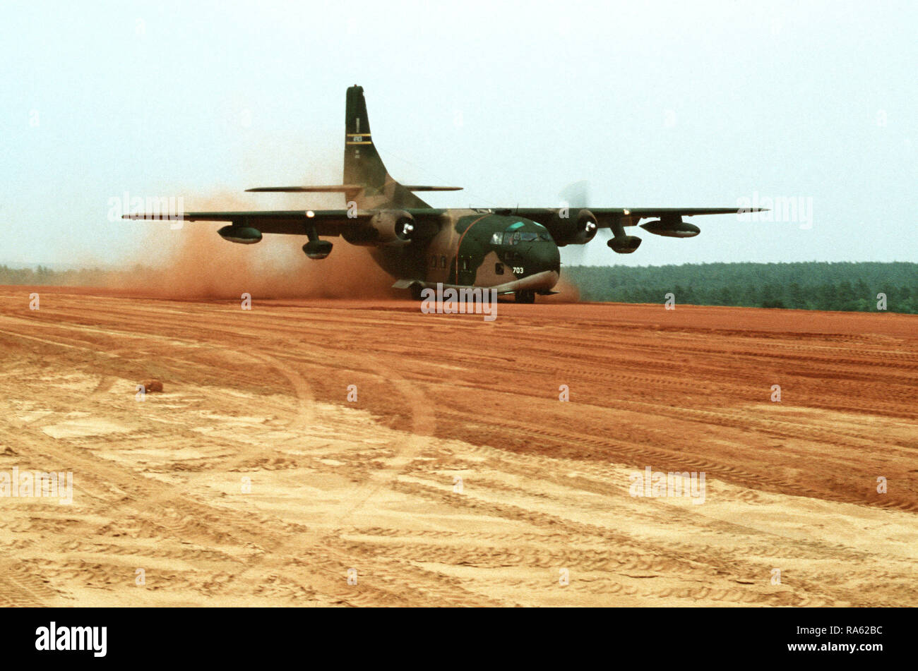 1979 - A C-123 Provider aircraft lands on an unimproved runway during Exercise VOLANT RODEO '79. Stock Photo