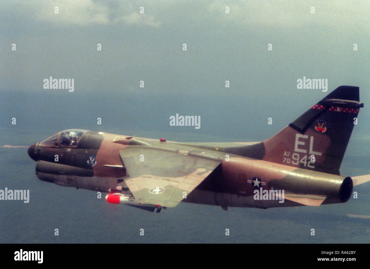 1979 - An air to air left side view of an A-7E Corsair II aircraft armed with an AGM-65F Maverick. Stock Photo