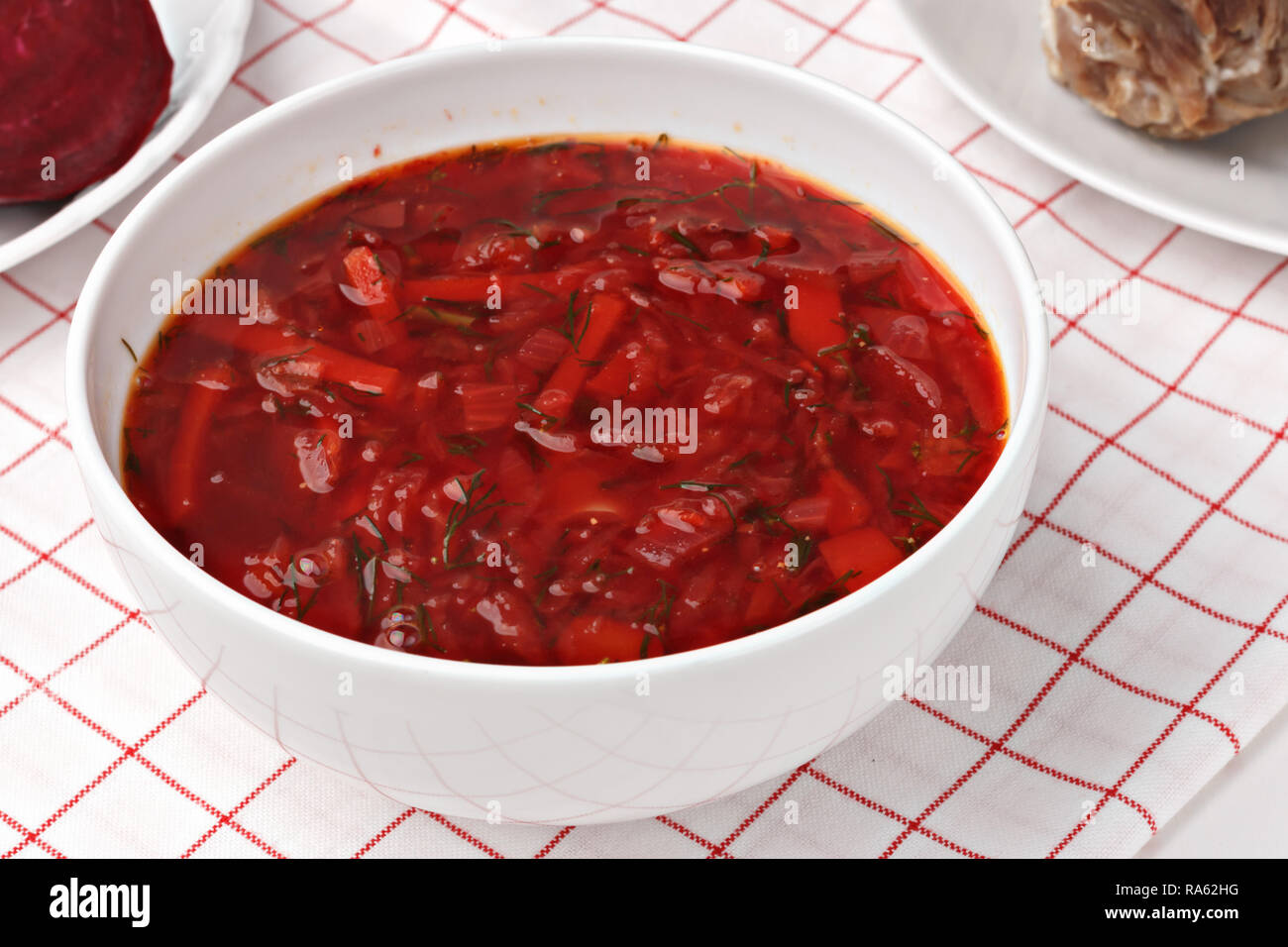 Russian and ukrainian national food - red beet soup, borscht . Closeup Stock Photo