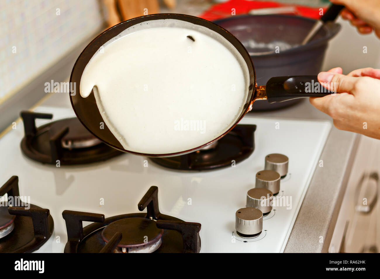 Closeup of cooking pancakes on a gas stove Stock Photo Alamy