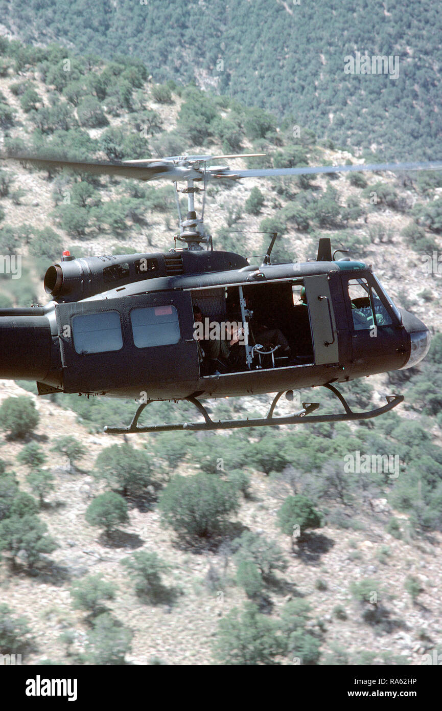 1973 A US Army Photographer Takes Photographs From A UH 1 Iroquois 