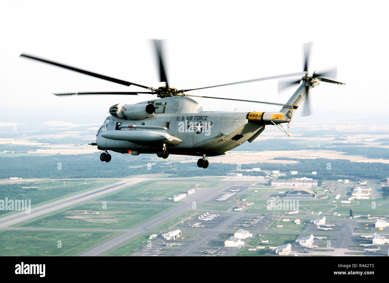 1978 - An air-to-air left side view of a 39th Aerospace Rescue and Recovery Wing HH-53 helicopter over Loring Air Force Base, Maine, while en route from Eglin Air Force Base, Fla., to Woodbridge, England. Stock Photo