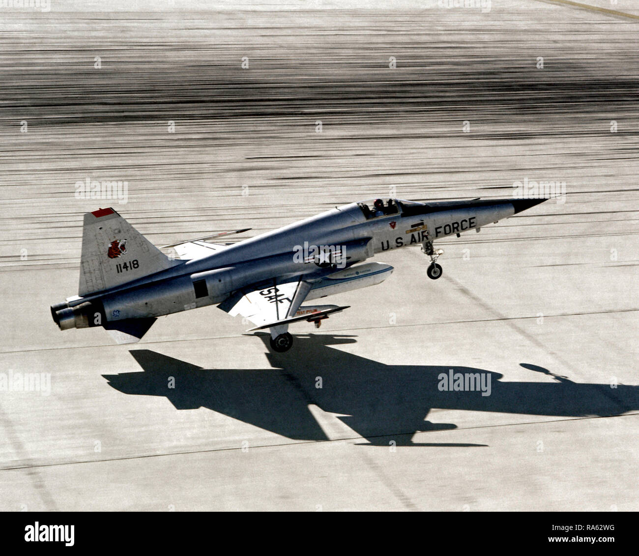 1979 An F5E Tiger II aircraft touches down on the runway after