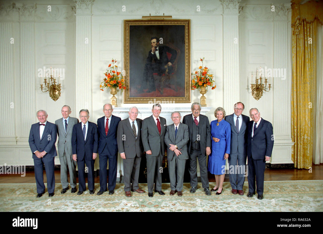 10/1/1985 President Reagan with Chief Justice Warren Burger Justice William Brennan Byron White Justice Thurgood Marshall Justice Harry Blackmun Justice Lewis Powell Justice William Rehnquist Justice John Paul Stevens Justice Sandra Day O'Connor and Justice Potter Stewart during a reception for the United States Supreme Court Justices in the State Dining Room Stock Photo