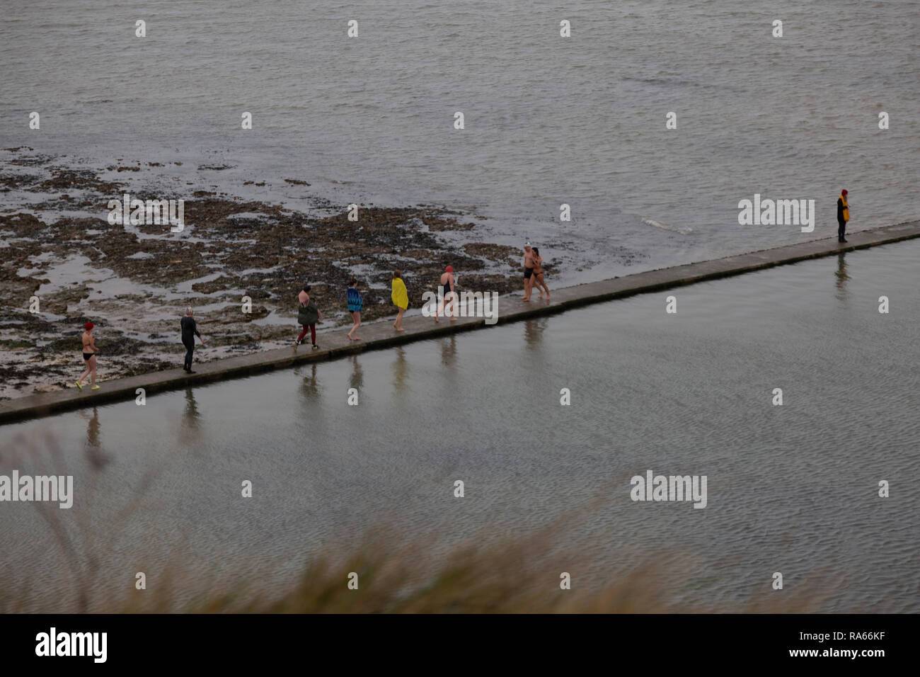 Cliftonville, Kent, UK. 1st Jan 2019. Swimmers braving the cold January waters of Walpole bays bathing pool in Cliftonville, Kent.2019 Credit: ernie jordan/Alamy Live News Stock Photo