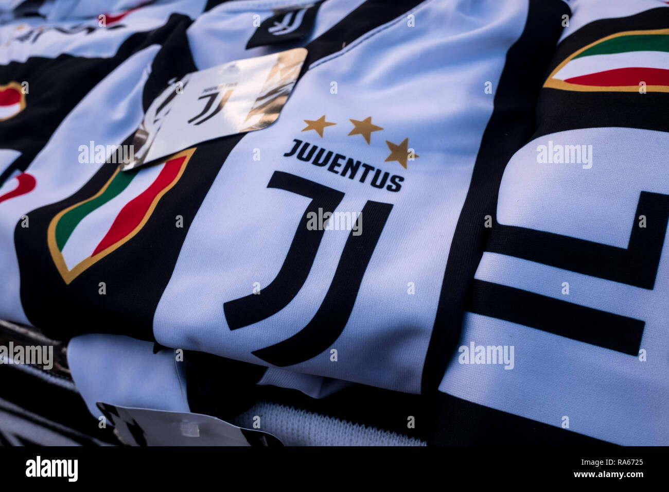Milan, Italy. 1st January, 2019. Milan, Inter and Juventus t-shirts and  gadgets for sale at a street vendor in front of the San Siro stadium, on  January 01 2019 Credit: Mairo Cinquetti/Alamy