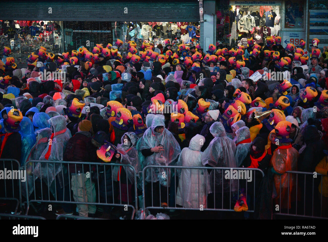 New York, USA. 31st December, 2018. New Years Eve revelers are seen during the Times Square New Year's Eve 2019 Celebration on December 31, 2018 in New York City. Credit: Erik Pendzich/Alamy Live News Stock Photo