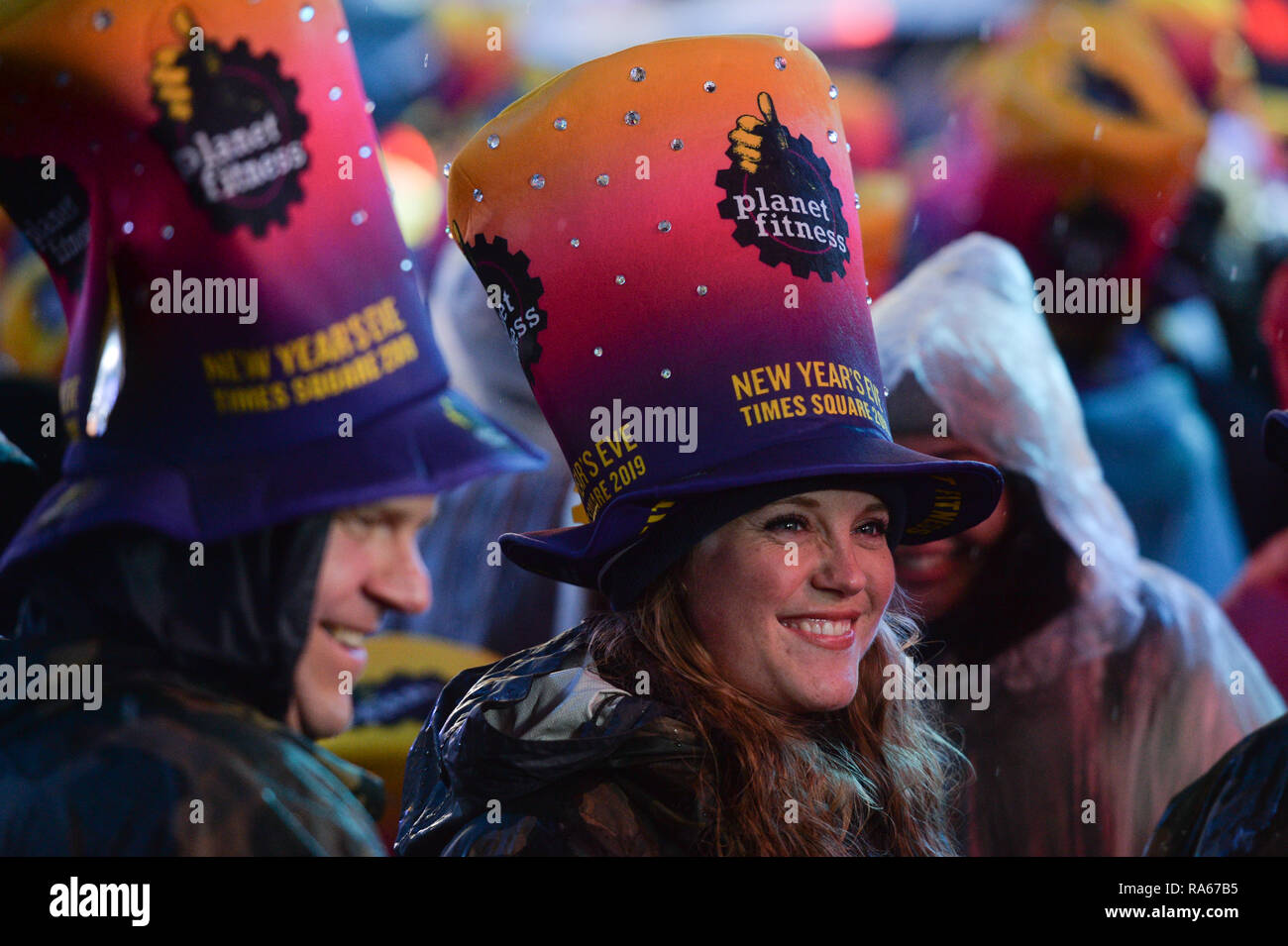 New York, USA. 31st December, 2018. New Years Eve revelers are seen during the Times Square New Year's Eve 2019 Celebration on December 31, 2018 in New York City. Credit: Erik Pendzich/Alamy Live News Stock Photo