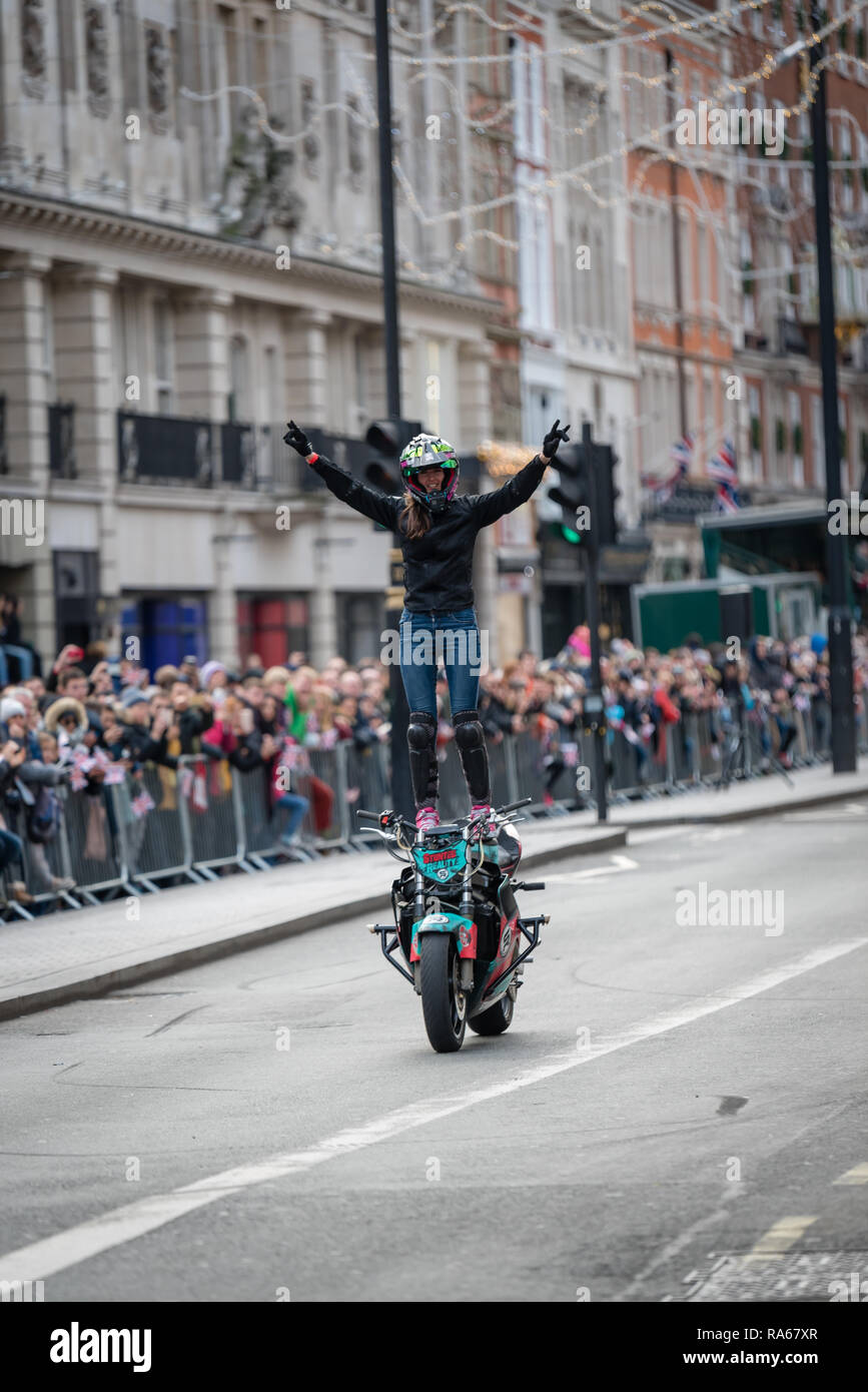 London, UK.  1 January 2019.   The theme of the parade this year was “London Welcomes the World”. With thousands of performers from a multitude of different countries and cultures from all around the world parade through central  London. Acts included Moto Stunts International.  Credit: Ilyas Ayub / Alamy Live News Stock Photo